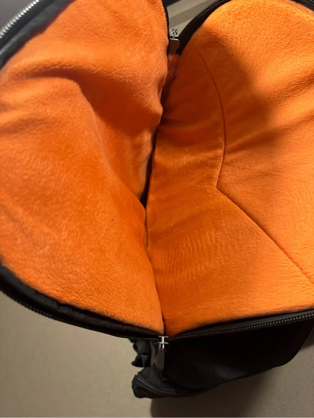 Black Men's Travel Backpack with Orange Accents Everki large laptop bag.